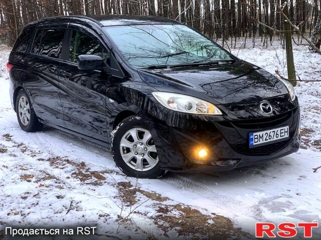 Черный Мазда 5, объемом двигателя 2 л и пробегом 140 тыс. км за 8799 $, фото 1 на Automoto.ua