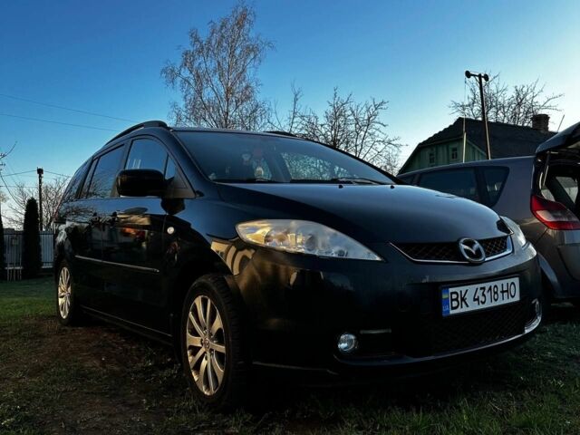 Черный Мазда 5, объемом двигателя 2 л и пробегом 280 тыс. км за 5200 $, фото 1 на Automoto.ua