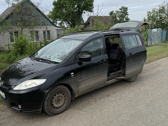 Черный Мазда 5, объемом двигателя 2.2 л и пробегом 550 тыс. км за 2300 $, фото 1 на Automoto.ua