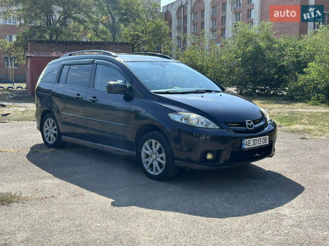 Фиолетовый Мазда 5, объемом двигателя 2 л и пробегом 200 тыс. км за 2999 $, фото 1 на Automoto.ua