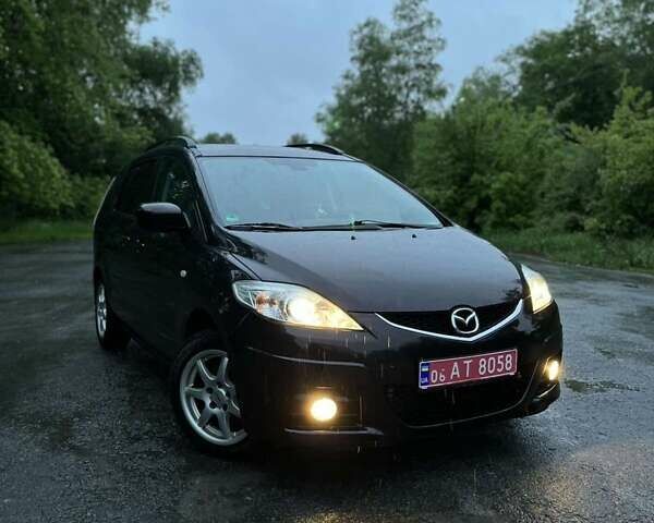 Фиолетовый Мазда 5, объемом двигателя 1.8 л и пробегом 250 тыс. км за 5700 $, фото 1 на Automoto.ua