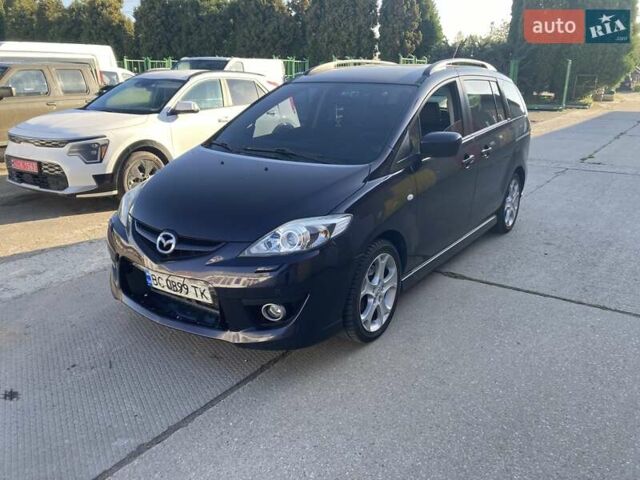 Фіолетовий Мазда 5, об'ємом двигуна 2 л та пробігом 207 тис. км за 7700 $, фото 1 на Automoto.ua