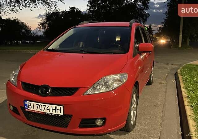 Красный Мазда 5, объемом двигателя 2 л и пробегом 320 тыс. км за 3900 $, фото 1 на Automoto.ua