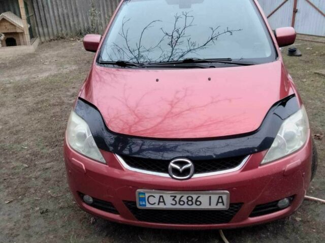 Красный Мазда 5, объемом двигателя 2 л и пробегом 210 тыс. км за 6500 $, фото 1 на Automoto.ua