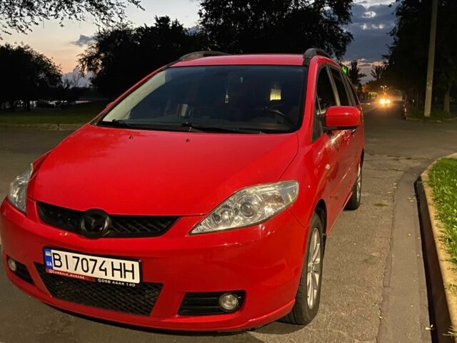 Красный Мазда 5, объемом двигателя 2 л и пробегом 320 тыс. км за 3900 $, фото 1 на Automoto.ua