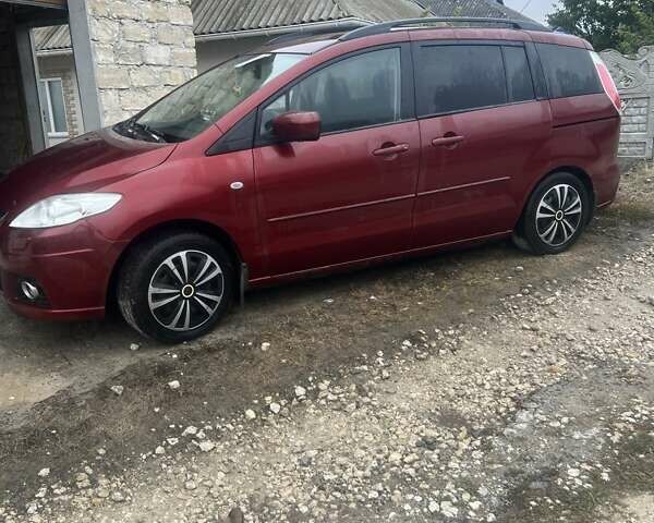Красный Мазда 5, объемом двигателя 1.8 л и пробегом 170 тыс. км за 6000 $, фото 1 на Automoto.ua
