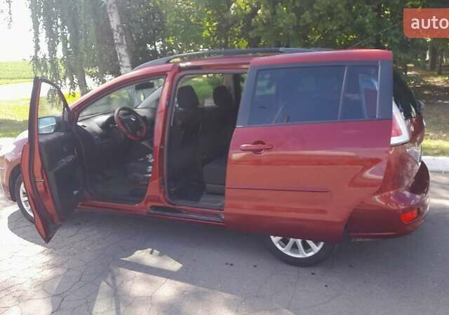 Красный Мазда 5, объемом двигателя 2 л и пробегом 222 тыс. км за 5800 $, фото 1 на Automoto.ua
