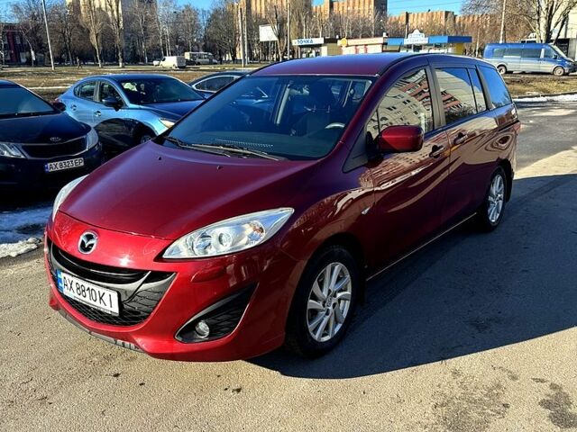 Красный Мазда 5, объемом двигателя 2 л и пробегом 270 тыс. км за 8200 $, фото 1 на Automoto.ua