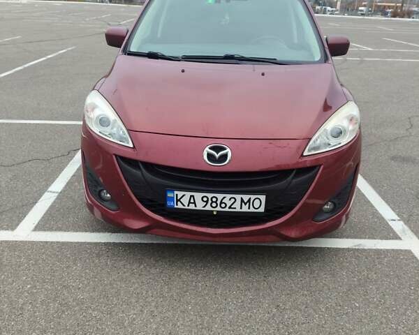 Красный Мазда 5, объемом двигателя 1.6 л и пробегом 235 тыс. км за 8300 $, фото 1 на Automoto.ua