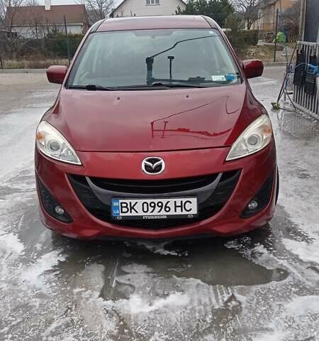 Красный Мазда 5, объемом двигателя 2.5 л и пробегом 185 тыс. км за 7500 $, фото 1 на Automoto.ua