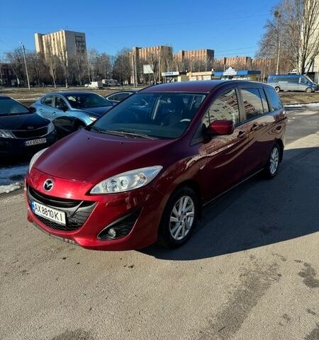 Красный Мазда 5, объемом двигателя 2 л и пробегом 270 тыс. км за 8200 $, фото 1 на Automoto.ua
