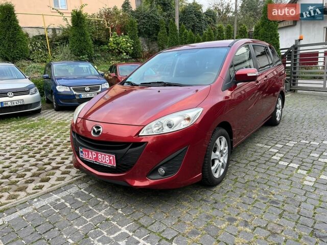 Красный Мазда 5, объемом двигателя 1.8 л и пробегом 232 тыс. км за 7600 $, фото 1 на Automoto.ua