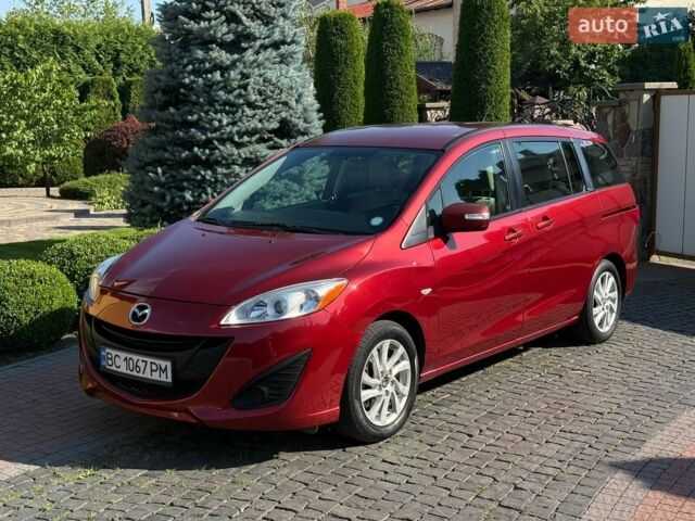 Красный Мазда 5, объемом двигателя 2.5 л и пробегом 238 тыс. км за 6500 $, фото 1 на Automoto.ua