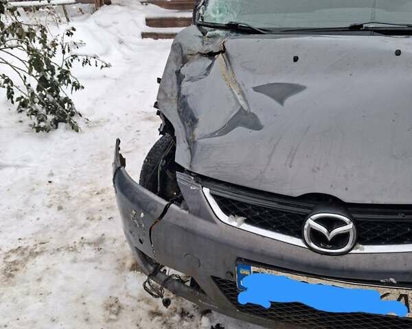 Мазда 5, объемом двигателя 2 л и пробегом 250 тыс. км за 3500 $, фото 1 на Automoto.ua