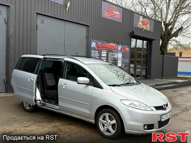 Серый Мазда 5, объемом двигателя 2 л и пробегом 1670 тыс. км за 4950 $, фото 1 на Automoto.ua