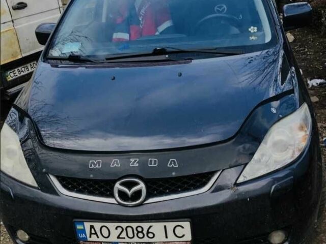 Серый Мазда 5, объемом двигателя 2 л и пробегом 280 тыс. км за 4150 $, фото 1 на Automoto.ua
