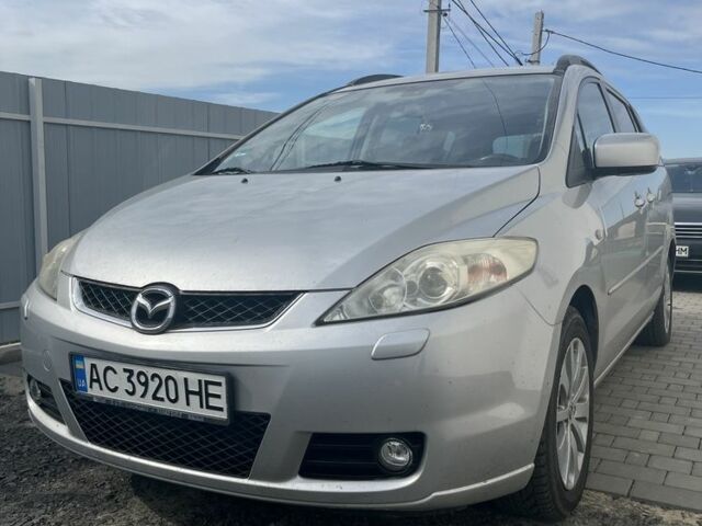 Серый Мазда 5, объемом двигателя 2 л и пробегом 221 тыс. км за 3800 $, фото 1 на Automoto.ua
