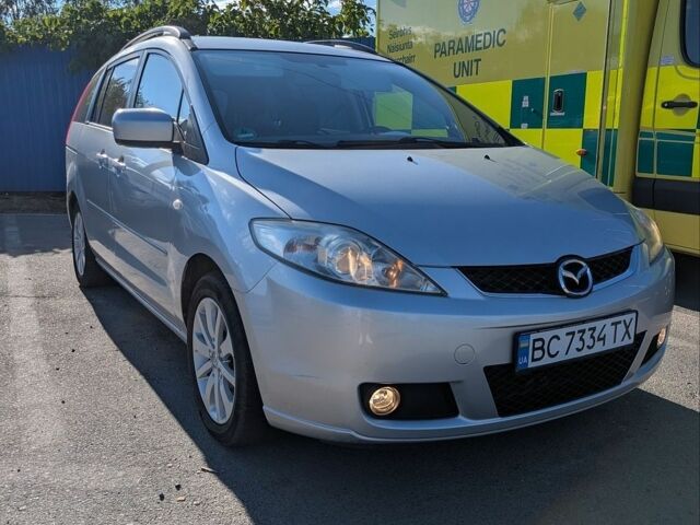 Серый Мазда 5, объемом двигателя 2 л и пробегом 239 тыс. км за 6000 $, фото 1 на Automoto.ua