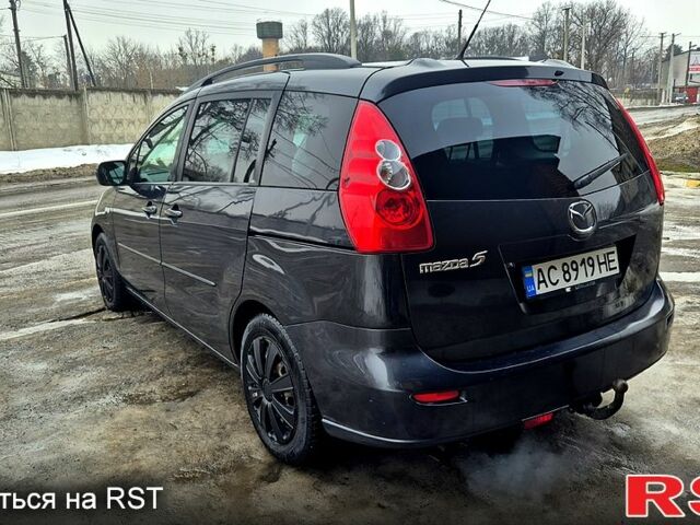 Серый Мазда 5, объемом двигателя 2 л и пробегом 20300 тыс. км за 5500 $, фото 1 на Automoto.ua