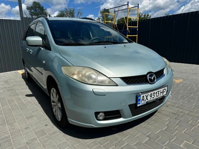 Серый Мазда 5, объемом двигателя 2 л и пробегом 234 тыс. км за 3800 $, фото 1 на Automoto.ua