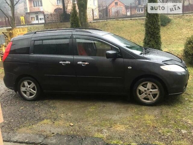 Серый Мазда 5, объемом двигателя 2 л и пробегом 350 тыс. км за 4500 $, фото 1 на Automoto.ua