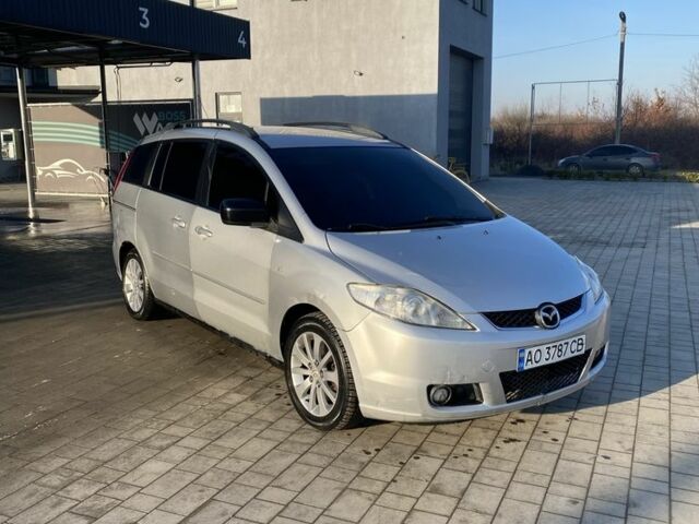 Серый Мазда 5, объемом двигателя 2 л и пробегом 340 тыс. км за 3850 $, фото 1 на Automoto.ua