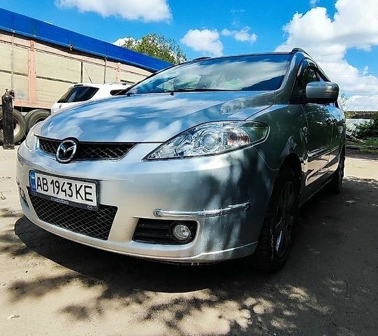 Серый Мазда 5, объемом двигателя 2 л и пробегом 161 тыс. км за 5300 $, фото 1 на Automoto.ua