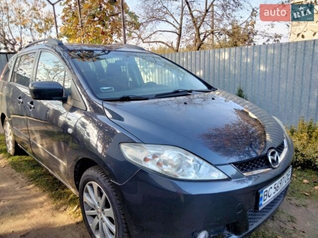 Серый Мазда 5, объемом двигателя 2 л и пробегом 240 тыс. км за 4650 $, фото 1 на Automoto.ua