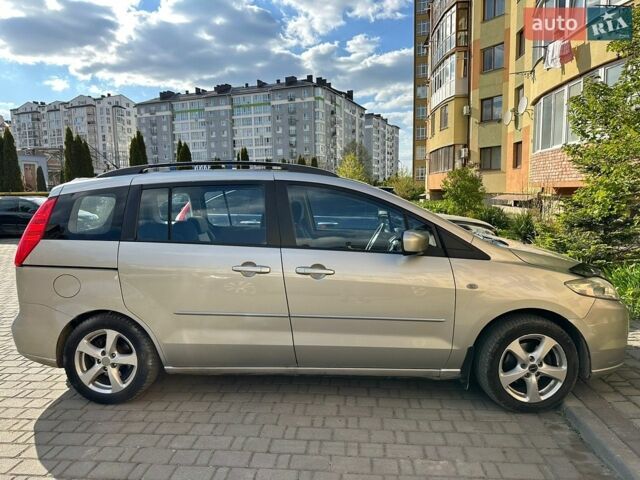Серый Мазда 5, объемом двигателя 2 л и пробегом 264 тыс. км за 3700 $, фото 1 на Automoto.ua