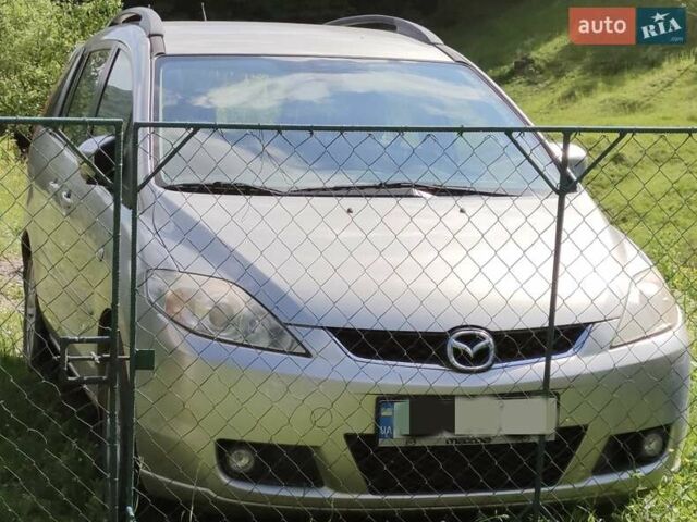 Серый Мазда 5, объемом двигателя 2.01 л и пробегом 145 тыс. км за 7000 $, фото 1 на Automoto.ua