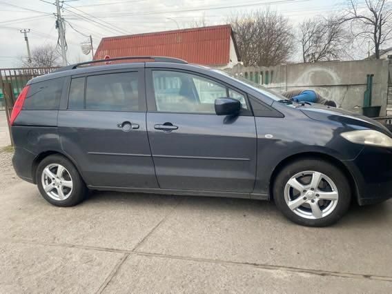 Серый Мазда 5, объемом двигателя 2 л и пробегом 280 тыс. км за 4000 $, фото 1 на Automoto.ua