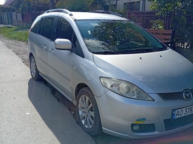Серый Мазда 5, объемом двигателя 2 л и пробегом 320 тыс. км за 3000 $, фото 1 на Automoto.ua