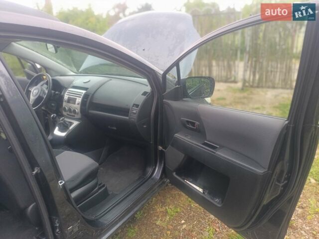 Серый Мазда 5, объемом двигателя 2 л и пробегом 317 тыс. км за 5500 $, фото 1 на Automoto.ua