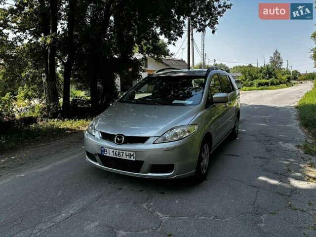 Серый Мазда 5, объемом двигателя 1.8 л и пробегом 321 тыс. км за 4508 $, фото 1 на Automoto.ua