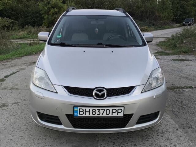 Серый Мазда 5, объемом двигателя 2 л и пробегом 265 тыс. км за 4918 $, фото 1 на Automoto.ua