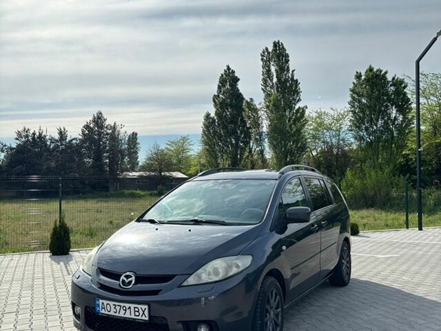 Серый Мазда 5, объемом двигателя 2 л и пробегом 376 тыс. км за 4700 $, фото 1 на Automoto.ua