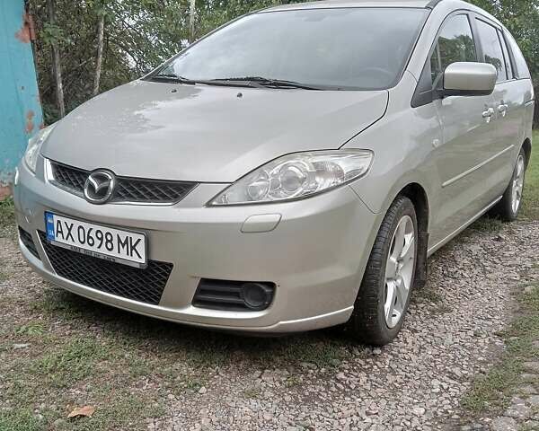 Серый Мазда 5, объемом двигателя 1.8 л и пробегом 213 тыс. км за 5548 $, фото 1 на Automoto.ua