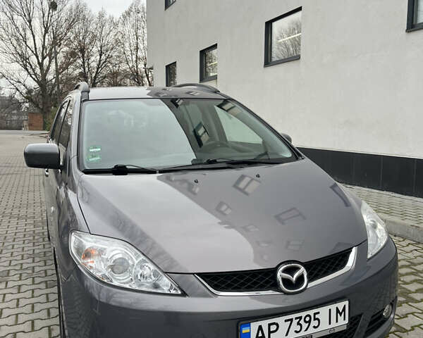 Серый Мазда 5, объемом двигателя 2 л и пробегом 205 тыс. км за 6500 $, фото 1 на Automoto.ua
