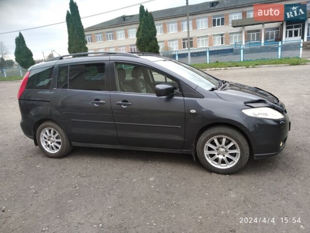 Серый Мазда 5, объемом двигателя 2 л и пробегом 285 тыс. км за 4550 $, фото 1 на Automoto.ua