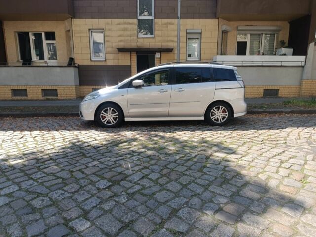 Серый Мазда 5, объемом двигателя 2 л и пробегом 336 тыс. км за 4740 $, фото 1 на Automoto.ua