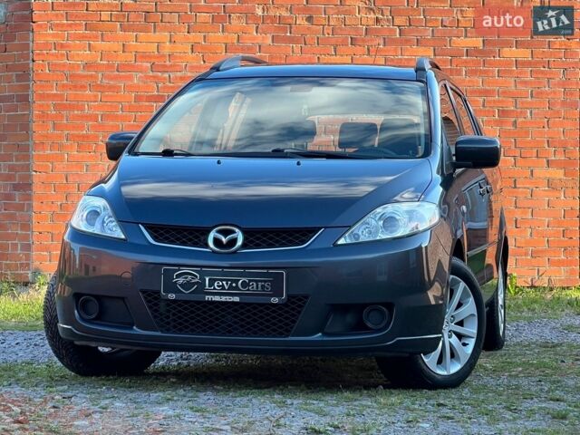 Серый Мазда 5, объемом двигателя 2 л и пробегом 280 тыс. км за 4250 $, фото 1 на Automoto.ua
