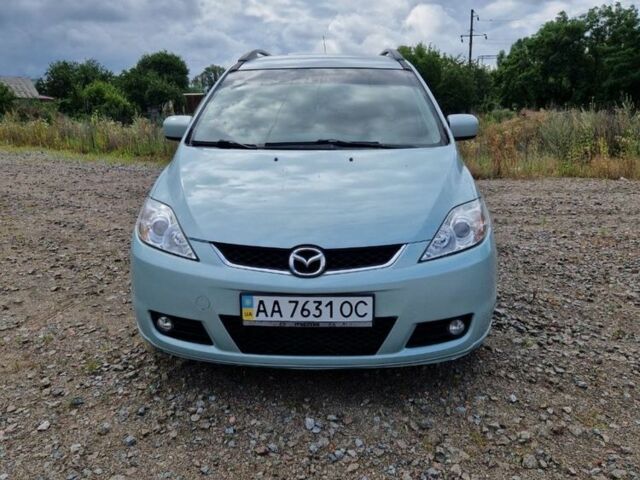 Серый Мазда 5, объемом двигателя 2 л и пробегом 213 тыс. км за 5268 $, фото 1 на Automoto.ua