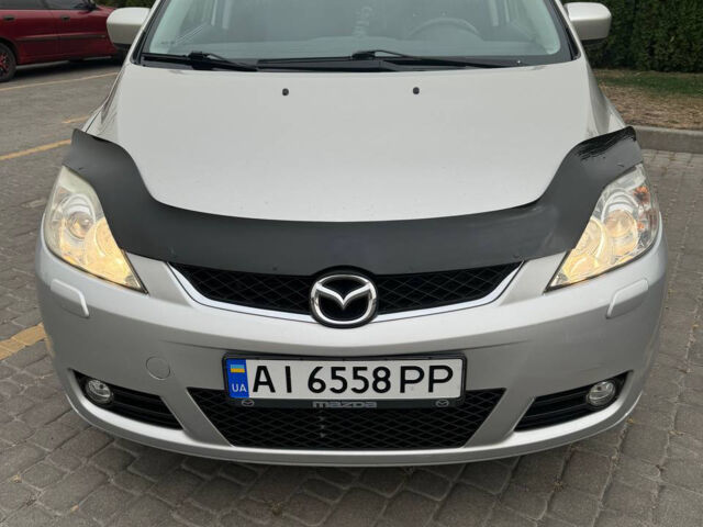 Серый Мазда 5, объемом двигателя 2 л и пробегом 210 тыс. км за 5600 $, фото 1 на Automoto.ua