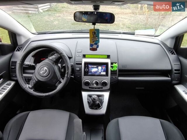 Серый Мазда 5, объемом двигателя 2 л и пробегом 240 тыс. км за 3100 $, фото 1 на Automoto.ua
