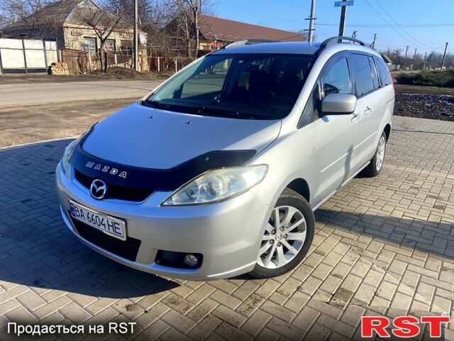 Серый Мазда 5, объемом двигателя 2 л и пробегом 350 тыс. км за 5500 $, фото 1 на Automoto.ua