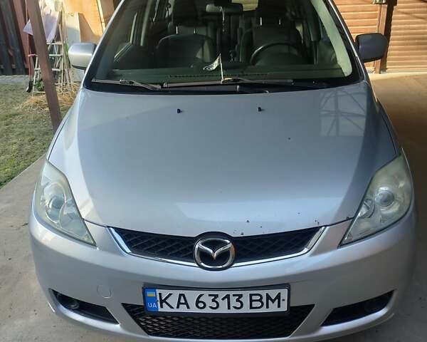 Серый Мазда 5, объемом двигателя 2 л и пробегом 334 тыс. км за 4500 $, фото 1 на Automoto.ua