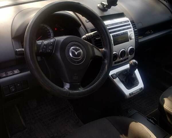 Серый Мазда 5, объемом двигателя 2 л и пробегом 366 тыс. км за 4500 $, фото 1 на Automoto.ua