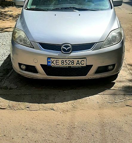 Серый Мазда 5, объемом двигателя 2 л и пробегом 290 тыс. км за 4300 $, фото 1 на Automoto.ua