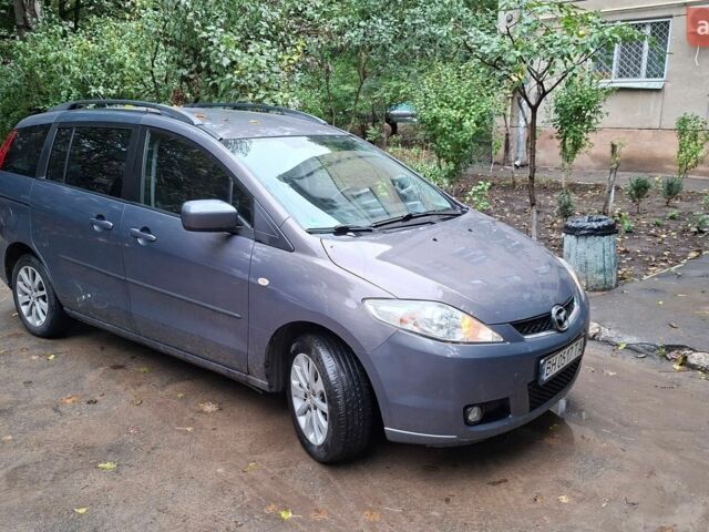 Серый Мазда 5, объемом двигателя 2 л и пробегом 316 тыс. км за 5200 $, фото 1 на Automoto.ua