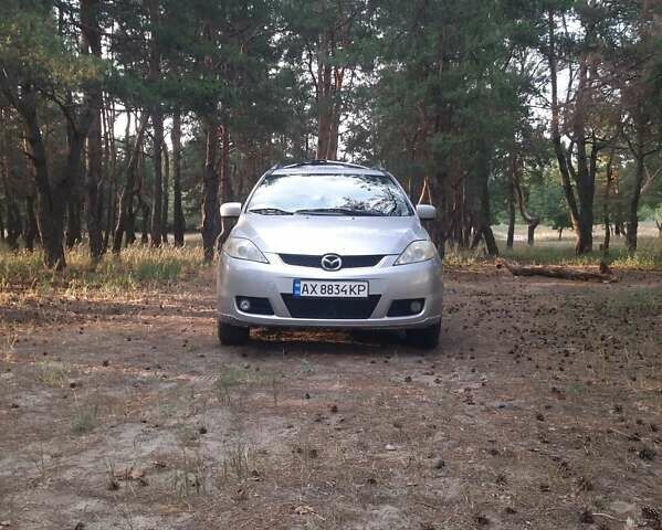 Серый Мазда 5, объемом двигателя 1.8 л и пробегом 287 тыс. км за 5600 $, фото 1 на Automoto.ua